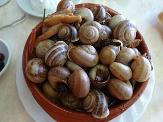 Eating snails en Es Cruce near Manacor, Mallorca